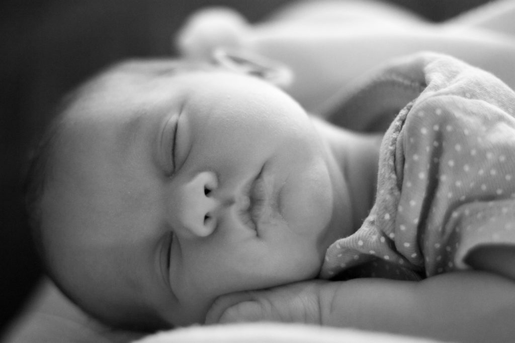 Sleeping baby, Image credit: Peasap, CC BY 2.0